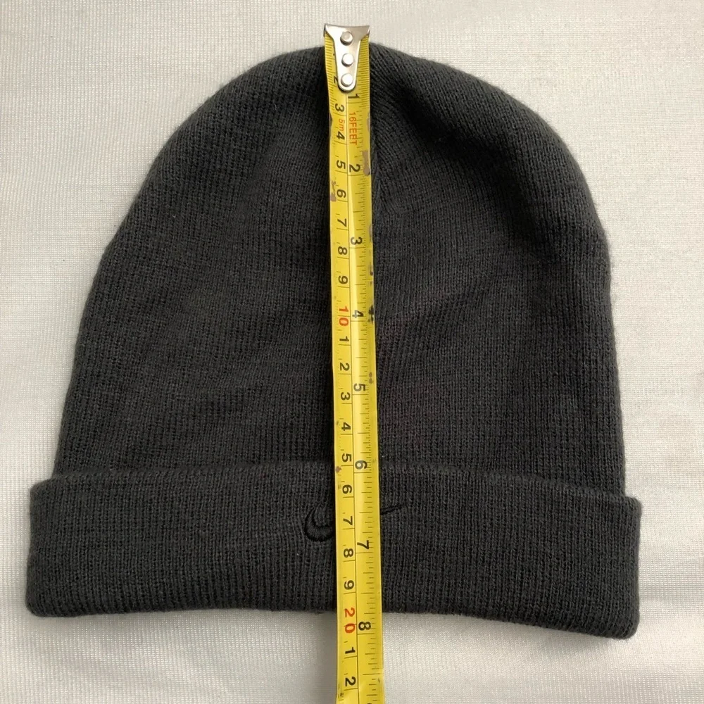 Nike dark gray beanie hat with black swoosh